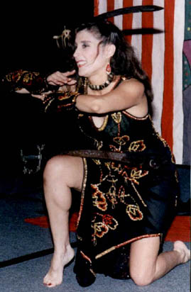 Daleela balances two swords